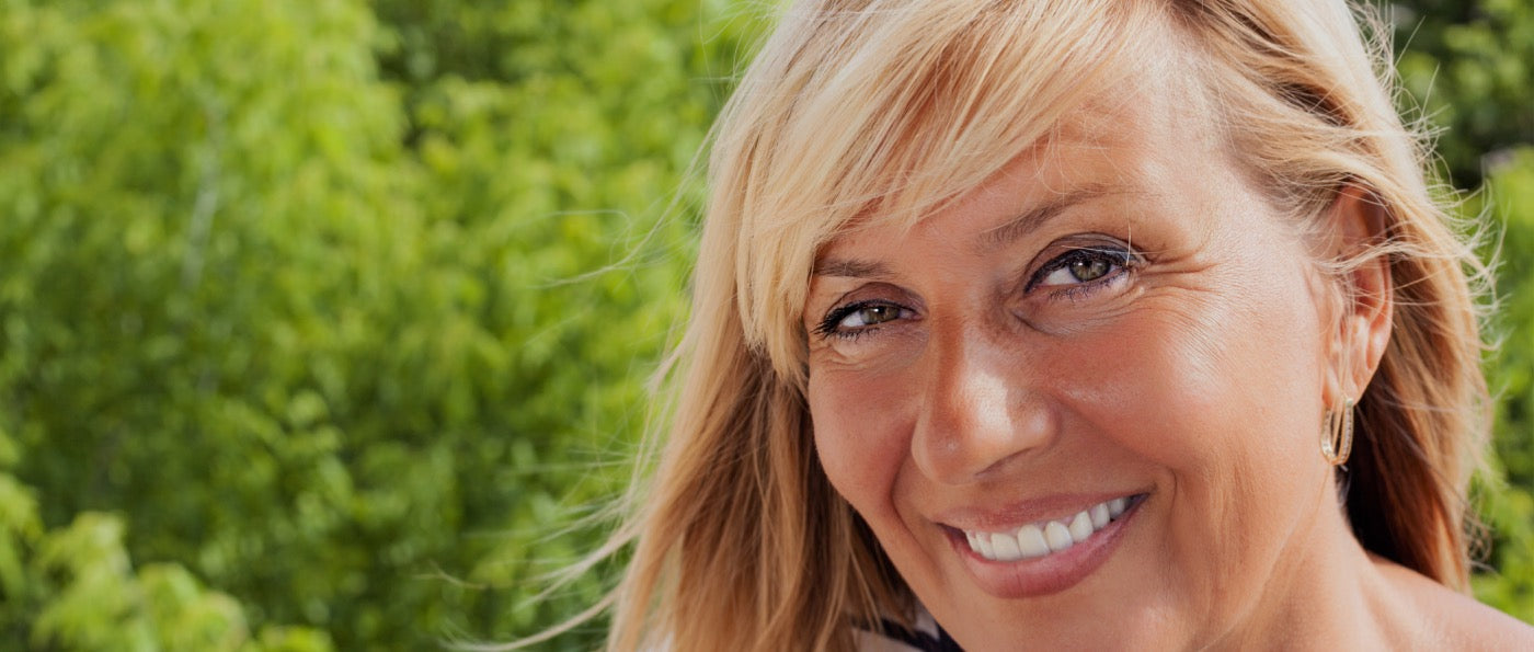 Confident woman outdoors in natural light